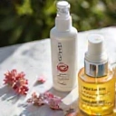 Radiant image of natural skincare products like serums and creams, emphasizing glowing skin.